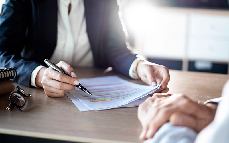woman holding papers
