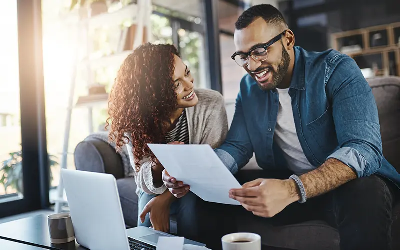 couple looking at laptop