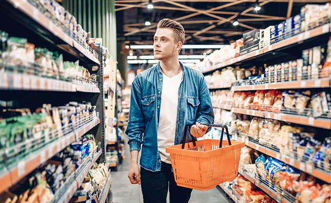 person shopping with cart in a store